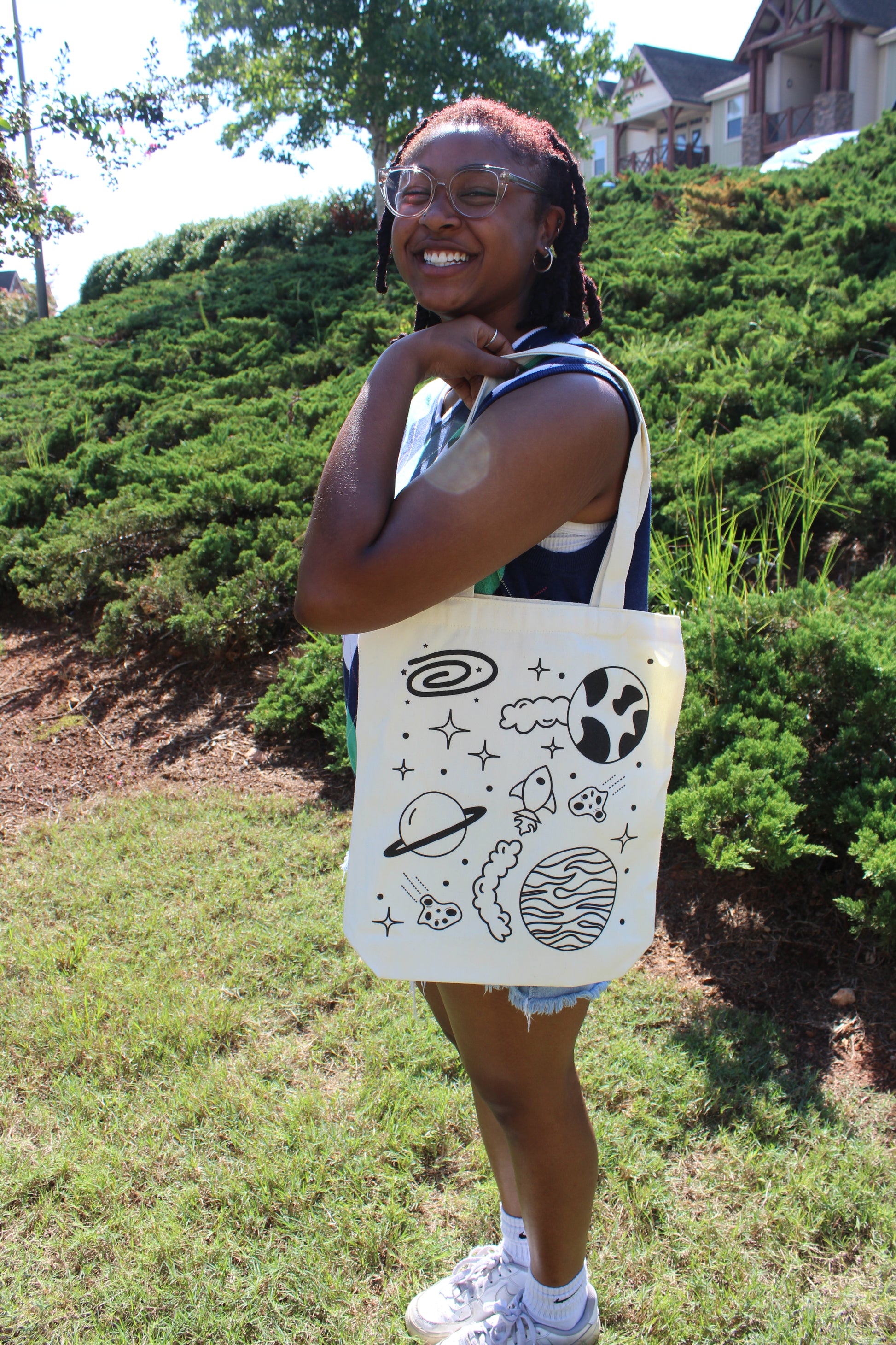 Girl looking back with Spaced Out tote over shoulder