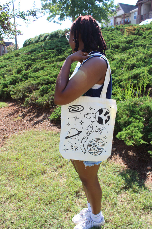 Girl with Spaced Out tote on shoulder outside