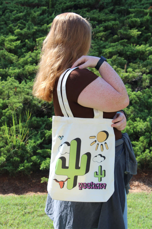 Girl looking forward with Western Cowgirl tote over shoulder outside