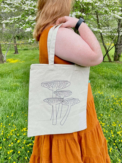 Keep it Shroomy tote hanging over shoulder