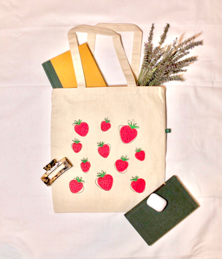 Super Berry tote with decorations and white background