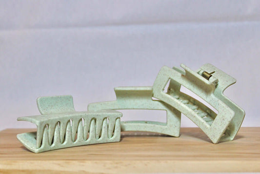 Three Pastel Green claw clips angled on top of each other