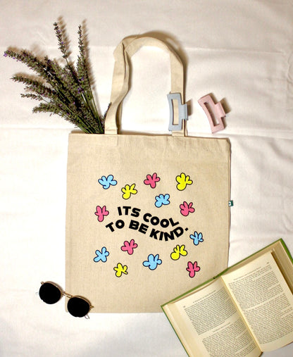 Kindness is Cool tote with decorations and white background